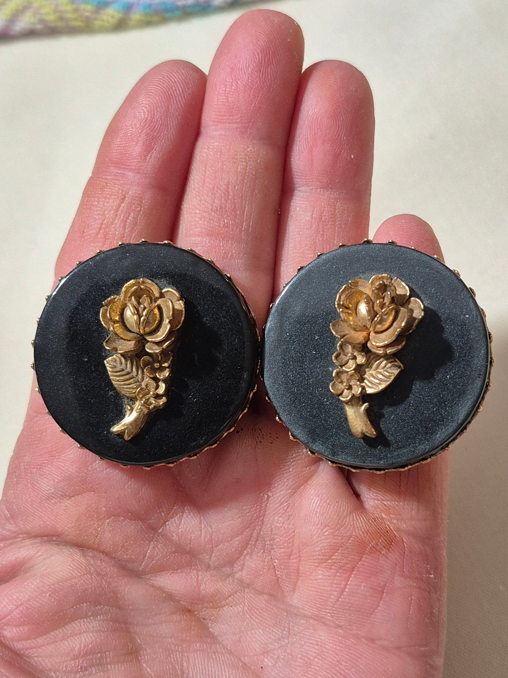 Large, 3-D rose earrings.