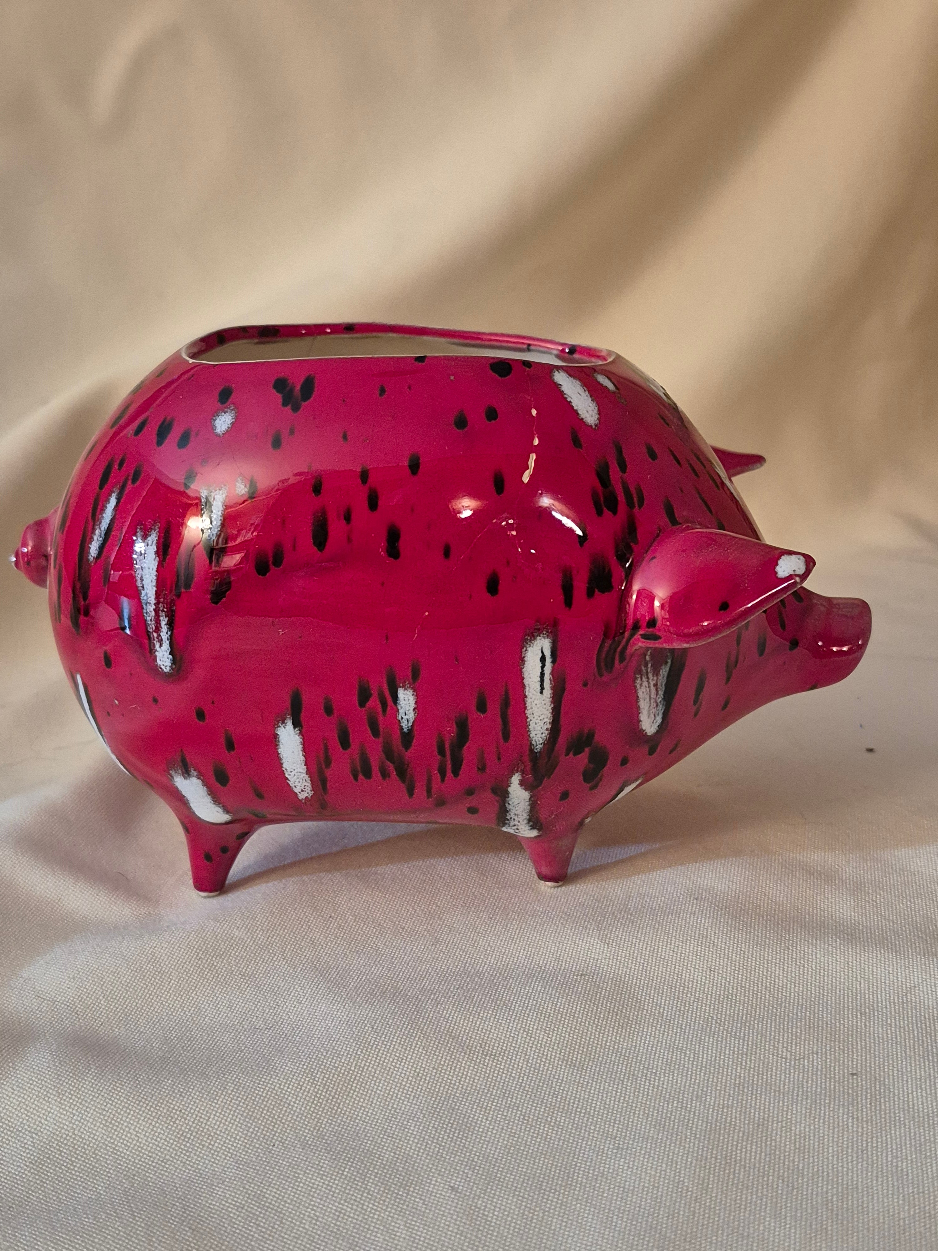 Red ceramic pig flower pot/ knick-knack holder.