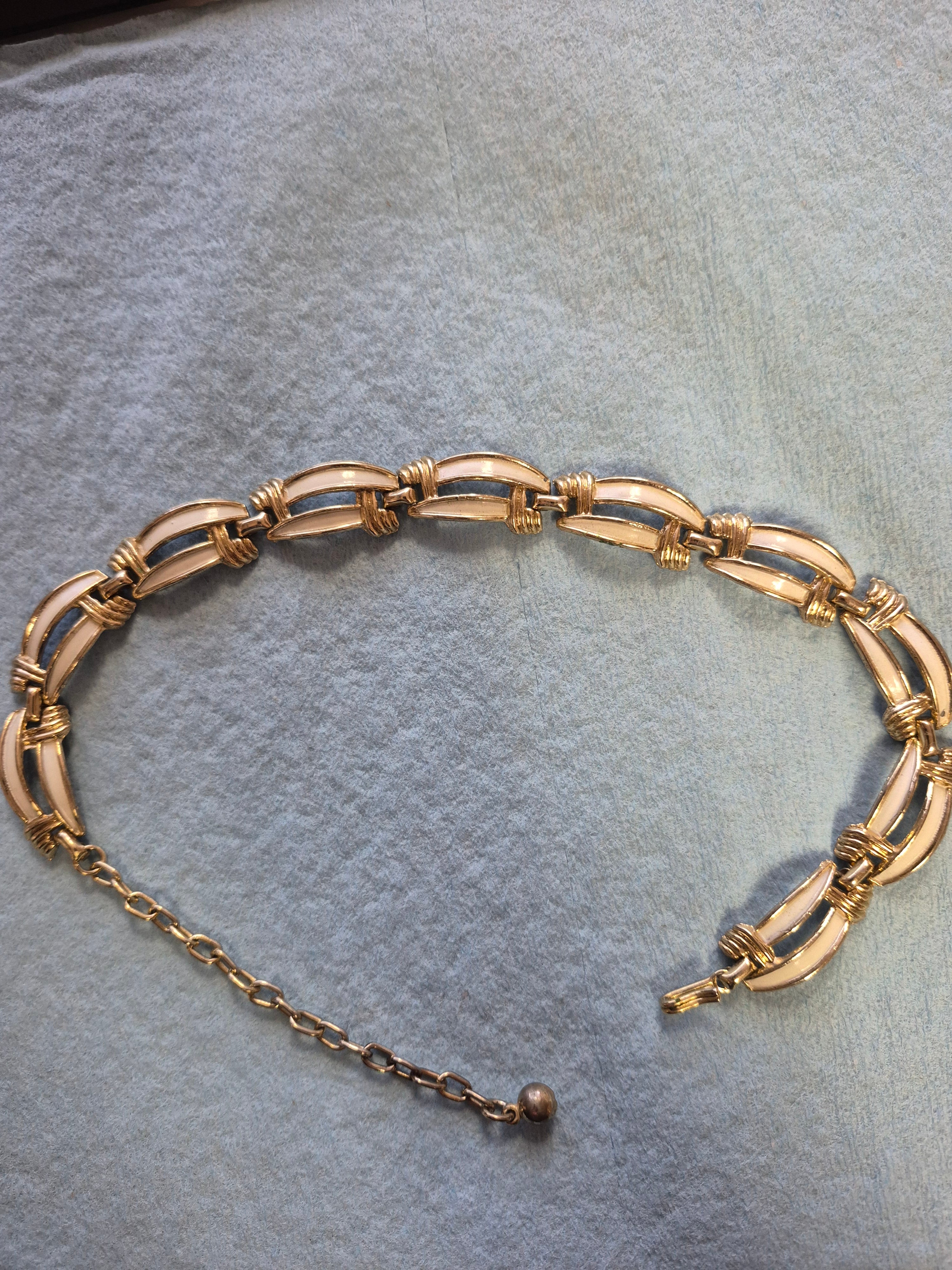 White and gold necklace