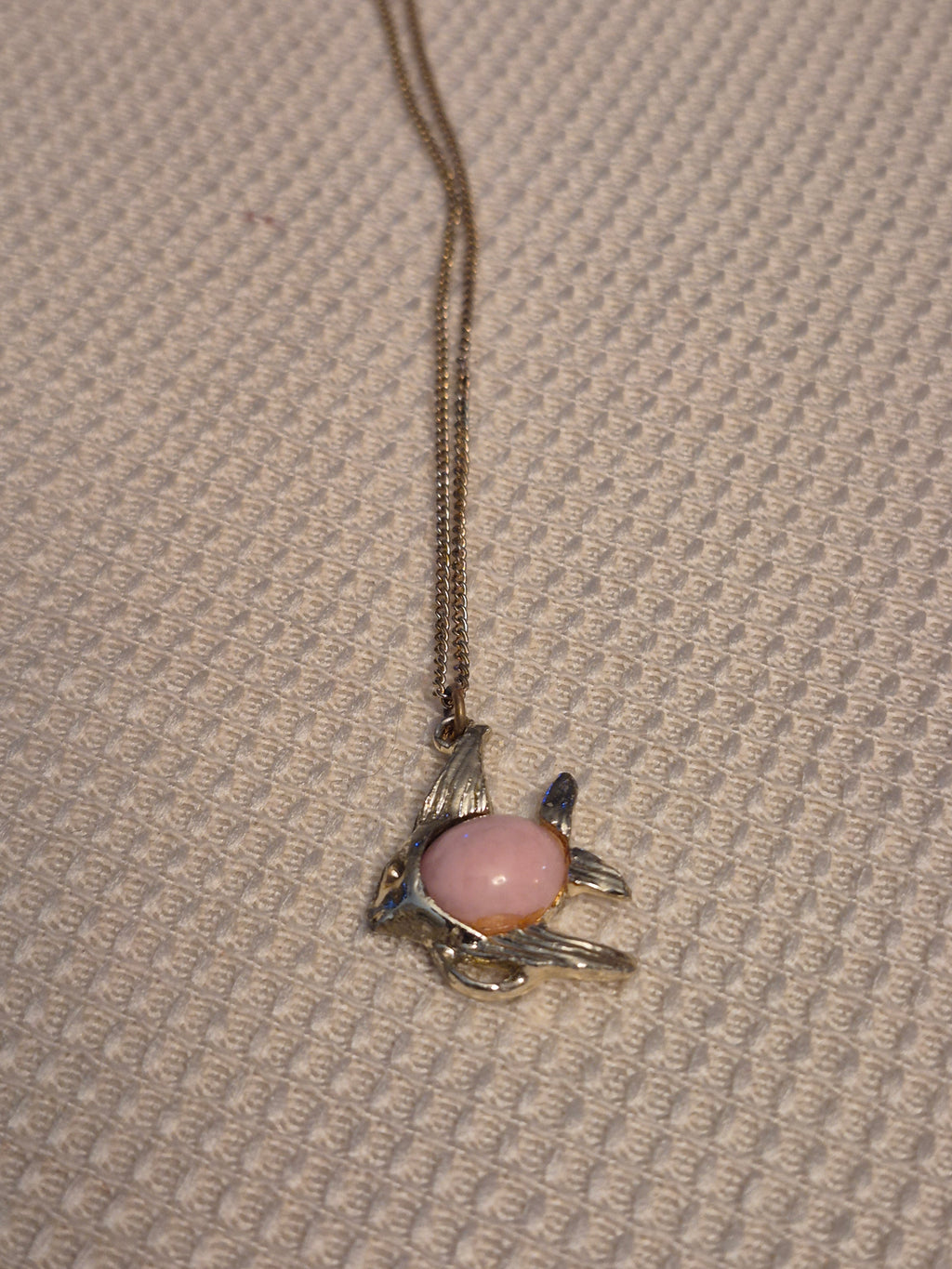 Pink and gold fish necklace