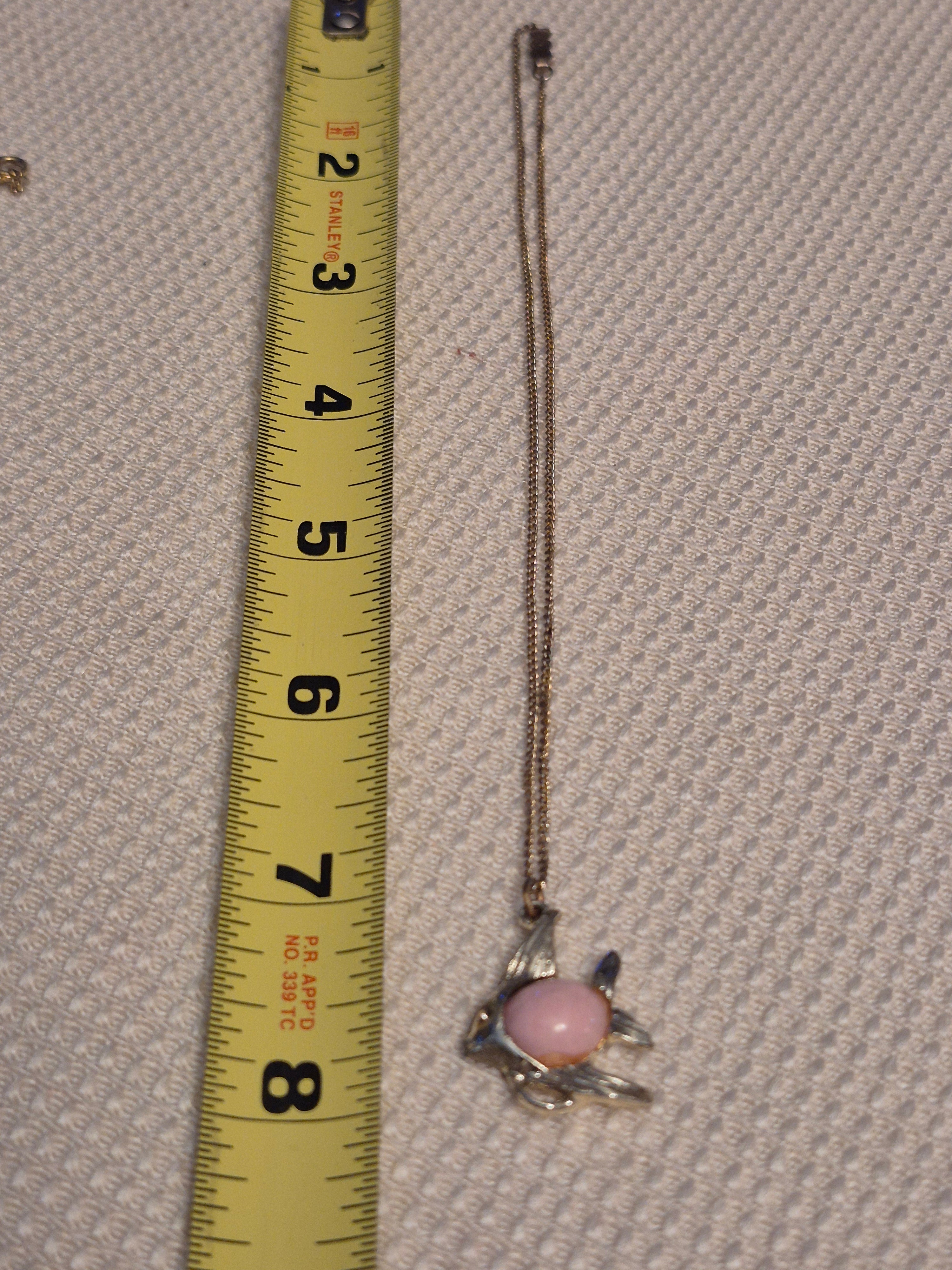 Pink and gold fish necklace