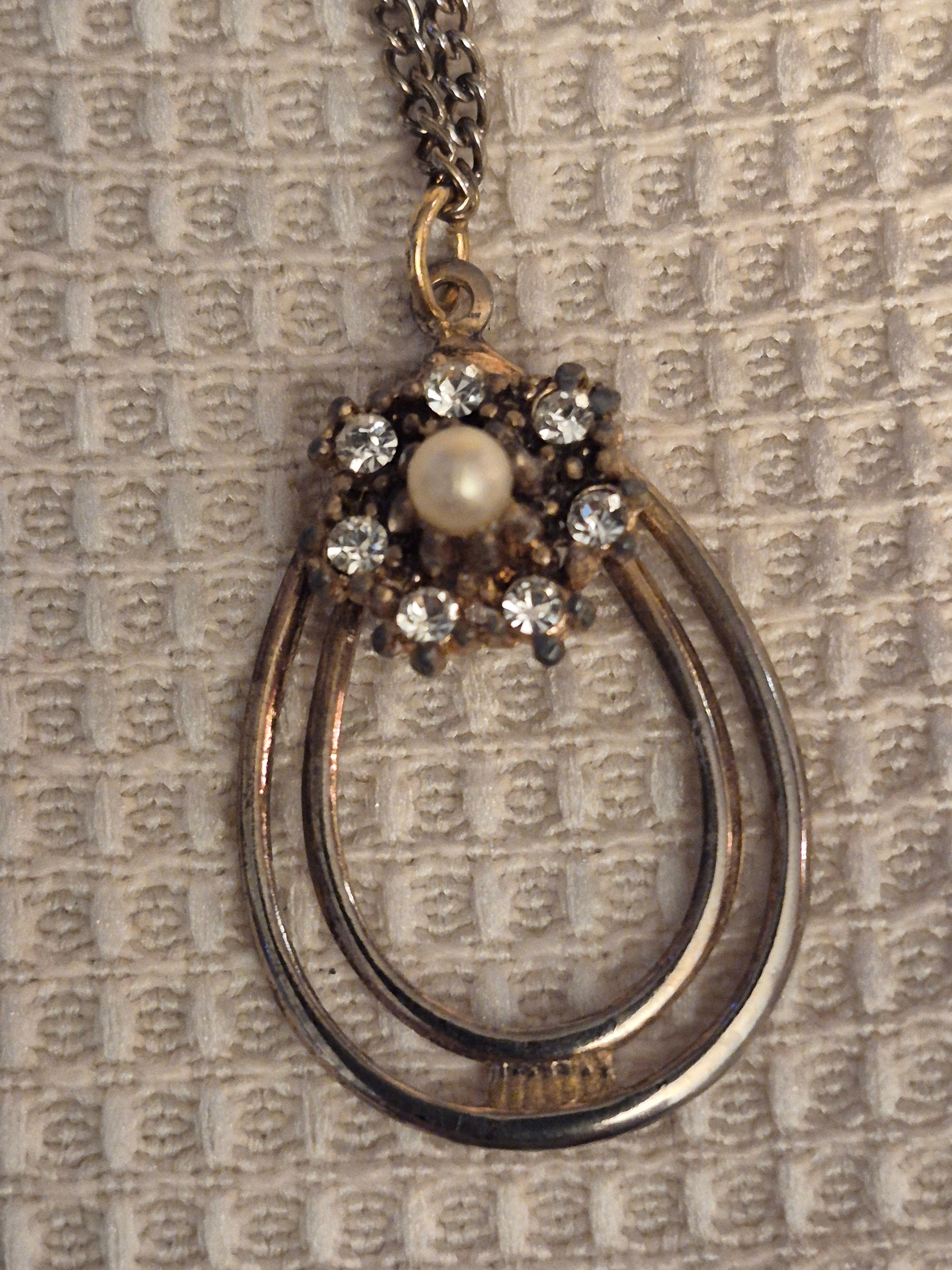 Gold-tone and diamond necklace