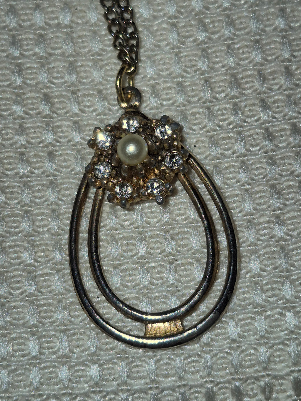 Gold-tone and diamond necklace