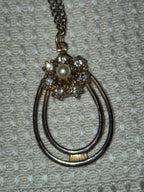 Gold-tone and diamond necklace