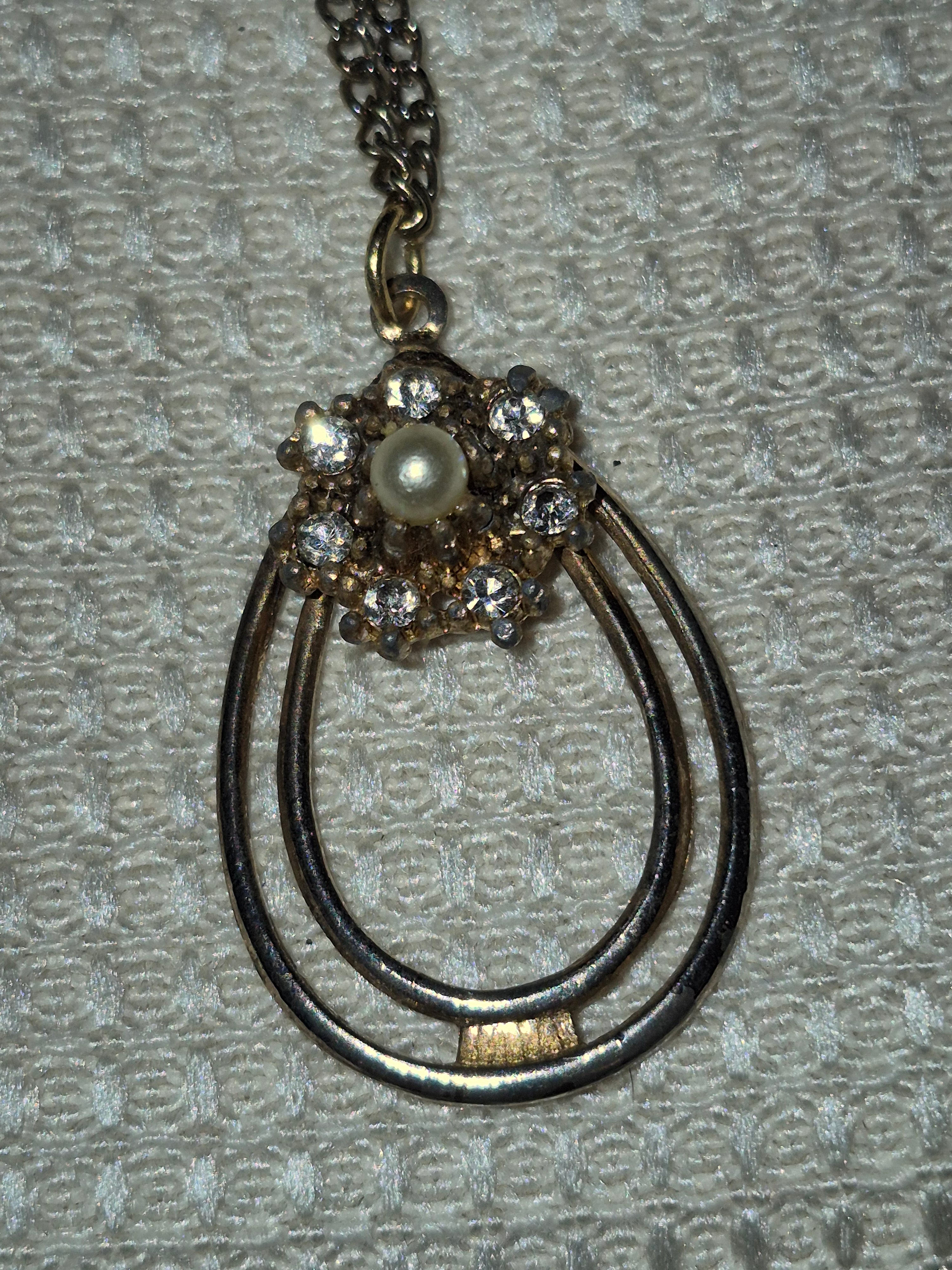 Gold-tone and diamond necklace