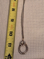 Gold-tone and diamond necklace